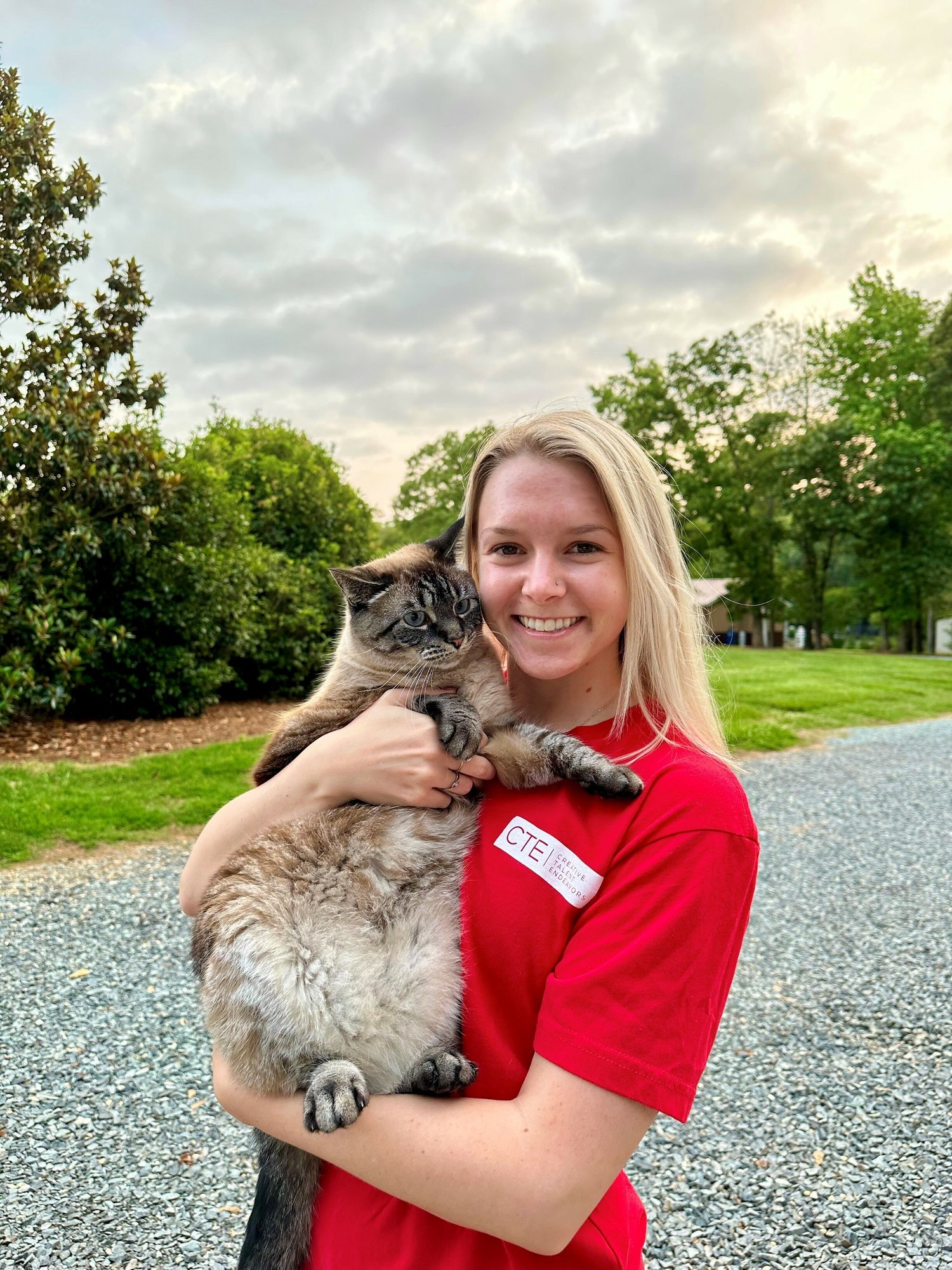 Chloe holding her cat, Storm